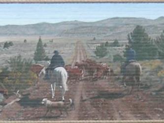 A mural of ranchers hearding cows