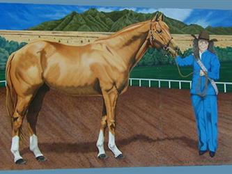 A mural of a lady with a horse