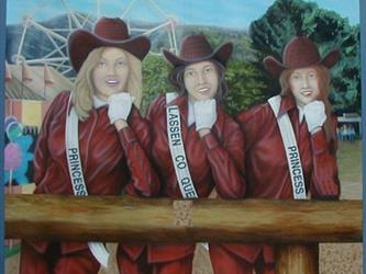 A mural of 3 women with sashes around them