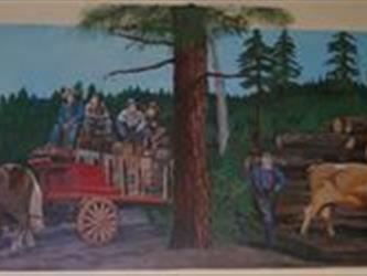 A wagon full of people going past a tree